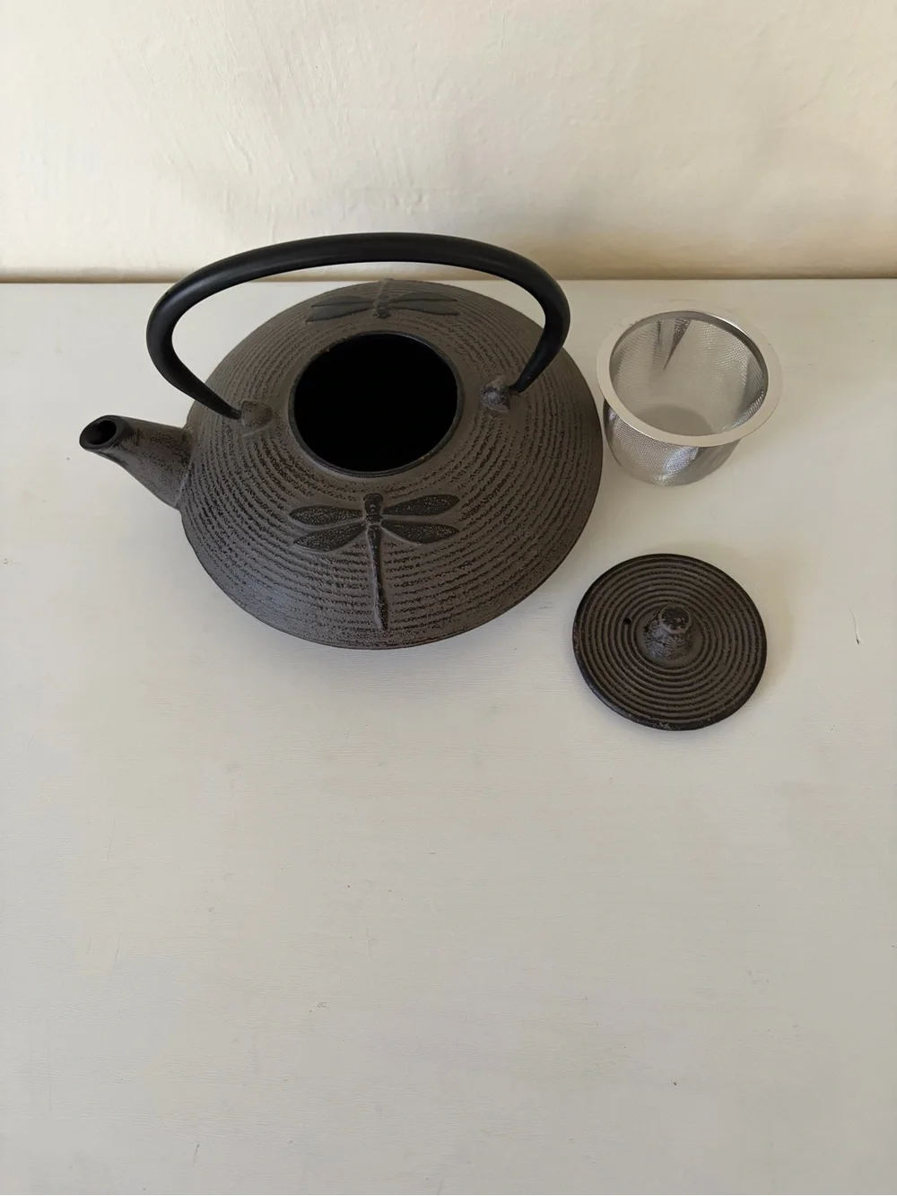 Black Cast Iron Dragonfly Motif Teapot with Curved Handle